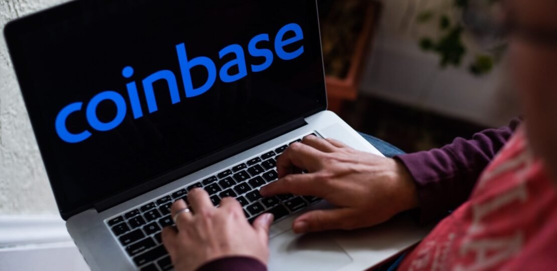 coinbase-logo-on-laptop-bloomberg-scaled.jpg