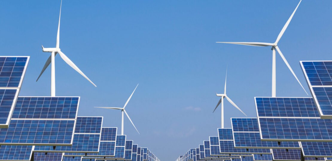photovoltaics-solar-panels-and-wind-turbines-125016564-AdobeStock-scaled.jpeg