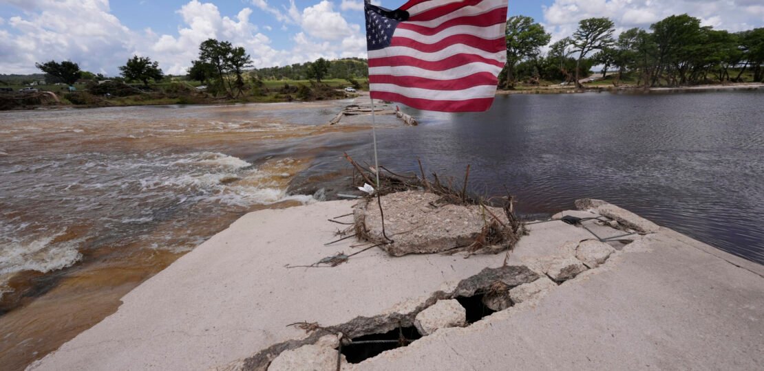 Texas-flood-Guadalupe-River-AmericanFlag-AP-scaled.jpg