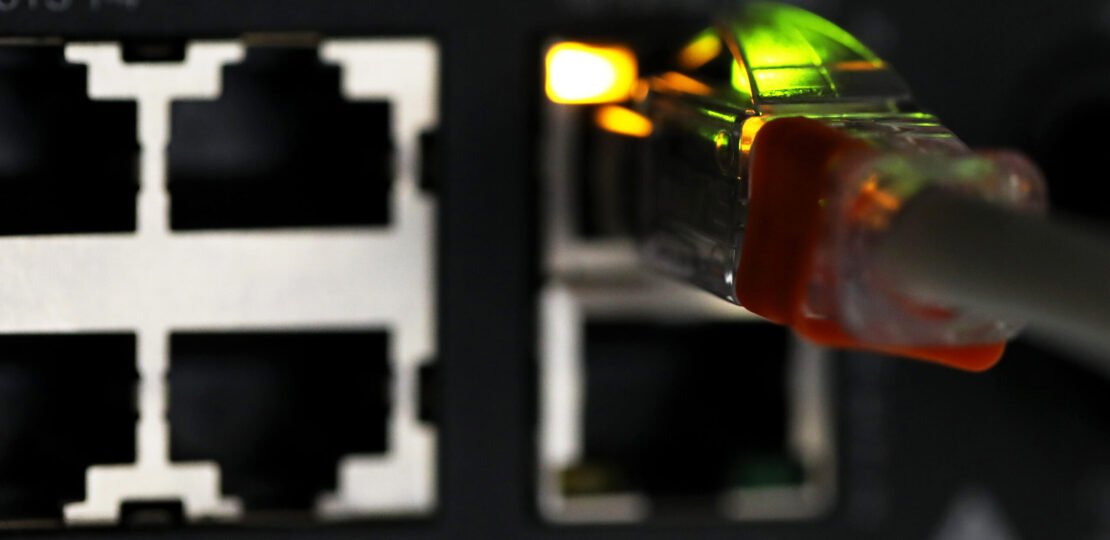 ethernet-cable-connects-router-device-bloomberg-scaled.jpg
