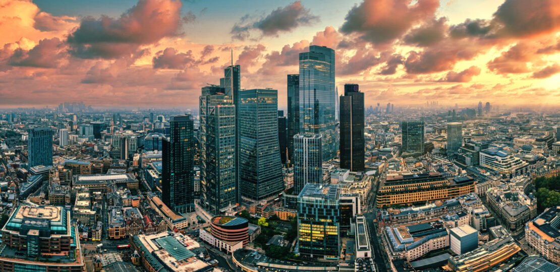 londons-financial-center-at-sunset-572465255-AdobeStock-scaled.jpeg