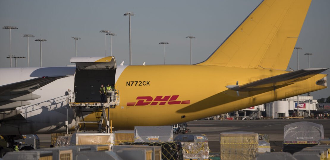 cargo-offloaded-from-DHL-aircraft-in-australia-bloomberg-scaled.jpg